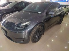Tesla Model Y Rear-Wheel Drive - ფოტო 1