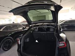 Tesla Model Y Rear-Wheel Drive - ფოტო 18
