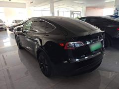 Tesla Model Y Rear-Wheel Drive - ფოტო 4