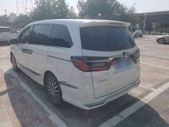 Honda Odyssey 2.0L e:HEV Premium - ფოტო 4