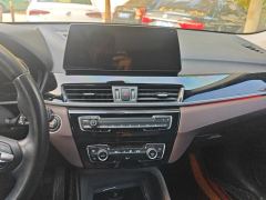 BMW X1 sDrive25Li Premier - ფოტო 17