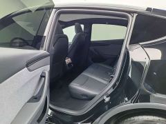 Tesla Model Y Rear-Wheel Drive - ფოტო 16