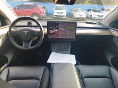 Tesla Model Y Standard Range RWD - ფოტო 9