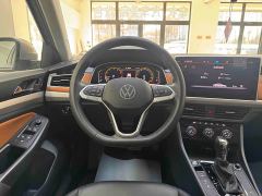 Volkswagen Bora 200TSI DSG Comfort Pro - ფოტო 16