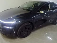 Tesla Model Y Rear-Wheel Drive - ფოტო 1