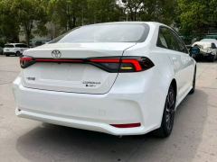 Toyota Corolla Dual-Engine 1.8L Flagship Edition - ფოტო 9