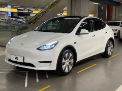 Tesla Model Y Rear-Wheel Drive - ფოტო 1