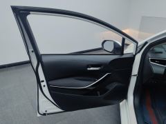 Toyota Corolla Dual-Engine 1.8L E-CVT Elite Edition - ფოტო 12