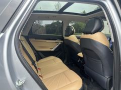 Geely Boyue L 1.5T Premium Version - ფოტო 14