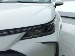 Toyota Corolla Dual-Engine 1.8L E-CVT Pioneer Edition - ფოტო 4