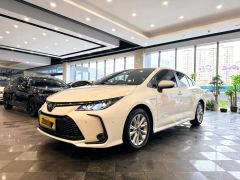 Toyota Corolla Dual-Engine 1.8L Elite Edition - ფოტო 1