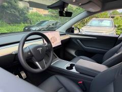 Tesla Model Y Rear-Wheel Drive - ფოტო 16