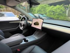 Tesla Model Y Rear-Wheel Drive - ფოტო 17