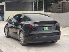 Tesla Model Y Rear-Wheel Drive - ფოტო 4