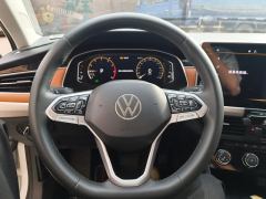 Volkswagen Bora 200TSI PRO Edition - ფოტო 18
