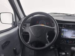 Wuling Zhiguang 1.5L Practical 5/7-seater - ფოტო 11