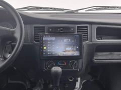 Wuling Zhiguang 1.5L Practical 5/7-seater - ფოტო 12