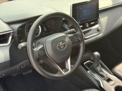 Toyota Corolla Hybrid 1.8L E-CVT Elite - ფოტო 7