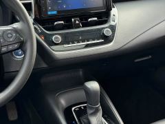 Toyota Corolla Hybrid 1.8L E-CVT Elite - ფოტო 8