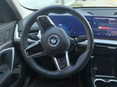 BMW iX1 eDrive25L X Design Package - ფოტო 18
