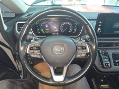 Honda Odyssey 2.0L e:HEV Luxury - ფოტო 10