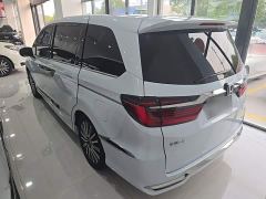 Honda Odyssey 2.0L e:HEV Luxury - ფოტო 4