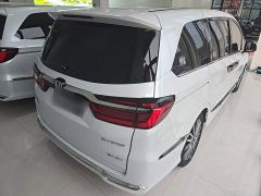 Honda Odyssey 2.0L e:HEV Luxury - ფოტო 6