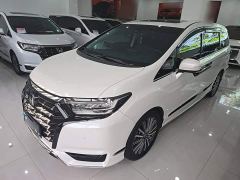 Honda Odyssey 2.0L e:HEV Premium - ფოტო 1