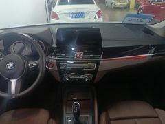 BMW X1 sDrive25Li Premier - ფოტო 17