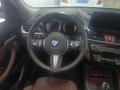 BMW X1 sDrive25Li Premier - ფოტო 18