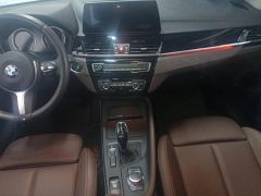 BMW X1 sDrive25Li Premier - ფოტო 19