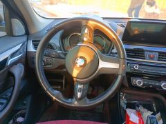 BMW X1 sDrive25Li Premier - ფოტო 18
