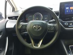 Toyota Corolla Dual-Engine 1.8L E-CVT Pioneer Edition - ფოტო 18
