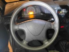 Wuling Body of Light Zhiguang 1.5L Practical 5/7-seater - ფოტო 18