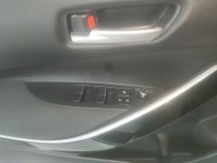 Toyota Corolla Dual-Engine 1.8L E-CVT Pioneer Edition - ფოტო 13