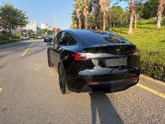Tesla Model Y Standard Range RWD - photo 13
