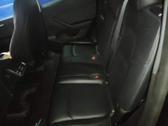 Tesla Model Y Rear-Wheel Drive - ფოტო 19