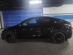 Tesla Model Y Rear-Wheel Drive - ფოტო 4