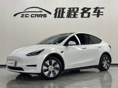 Tesla Model Y Rear-Wheel Drive - ფოტო 1
