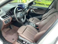 BMW X1 sDrive25Li Premier - ფოტო 4