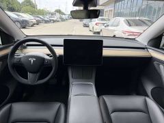 Tesla Model Y Rear-Wheel Drive - ფოტო 3