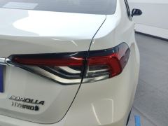 Toyota Corolla Dual-Engine 1.8L E-CVT Elite Edition - ფოტო 5