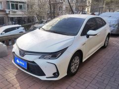 Toyota Corolla Dual-Engine 1.8L E-CVT Pioneer Edition - ფოტო 1