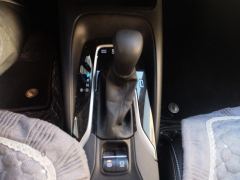 Toyota Corolla Dual-Engine 1.8L E-CVT Pioneer Edition - ფოტო 19