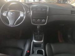 Nissan Tiida 1.6L Edition - ფოტო 16