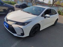 Toyota Corolla Dual-Engine 1.8L Elite Edition - ფოტო 1