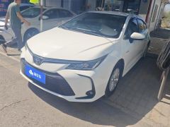Toyota Corolla Dual-Engine 1.8L E-CVT Elite Edition - ფოტო 1