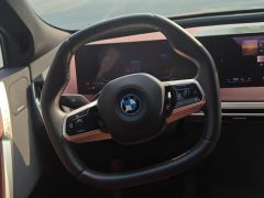 BMW iX xDrive50 - ფოტო 18