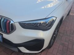 BMW X1 sDrive25Li Premier - photo 4
