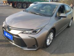 Toyota Corolla Dual-Engine 1.8L E-CVT Elite Edition - ფოტო 1